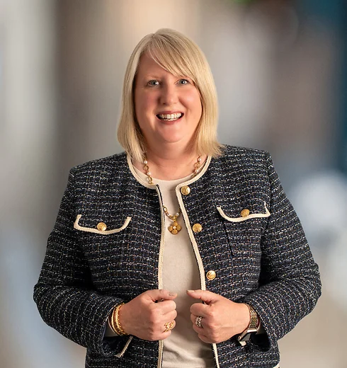 Lisa Hudson Kim in black tweed jacket