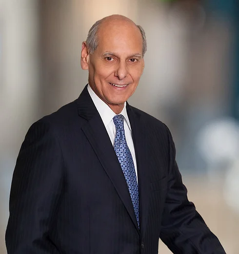 Vince Mastracco in dark suit.