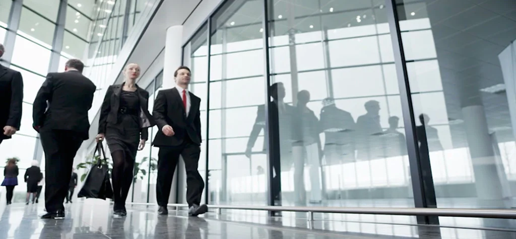 People walking through an open office