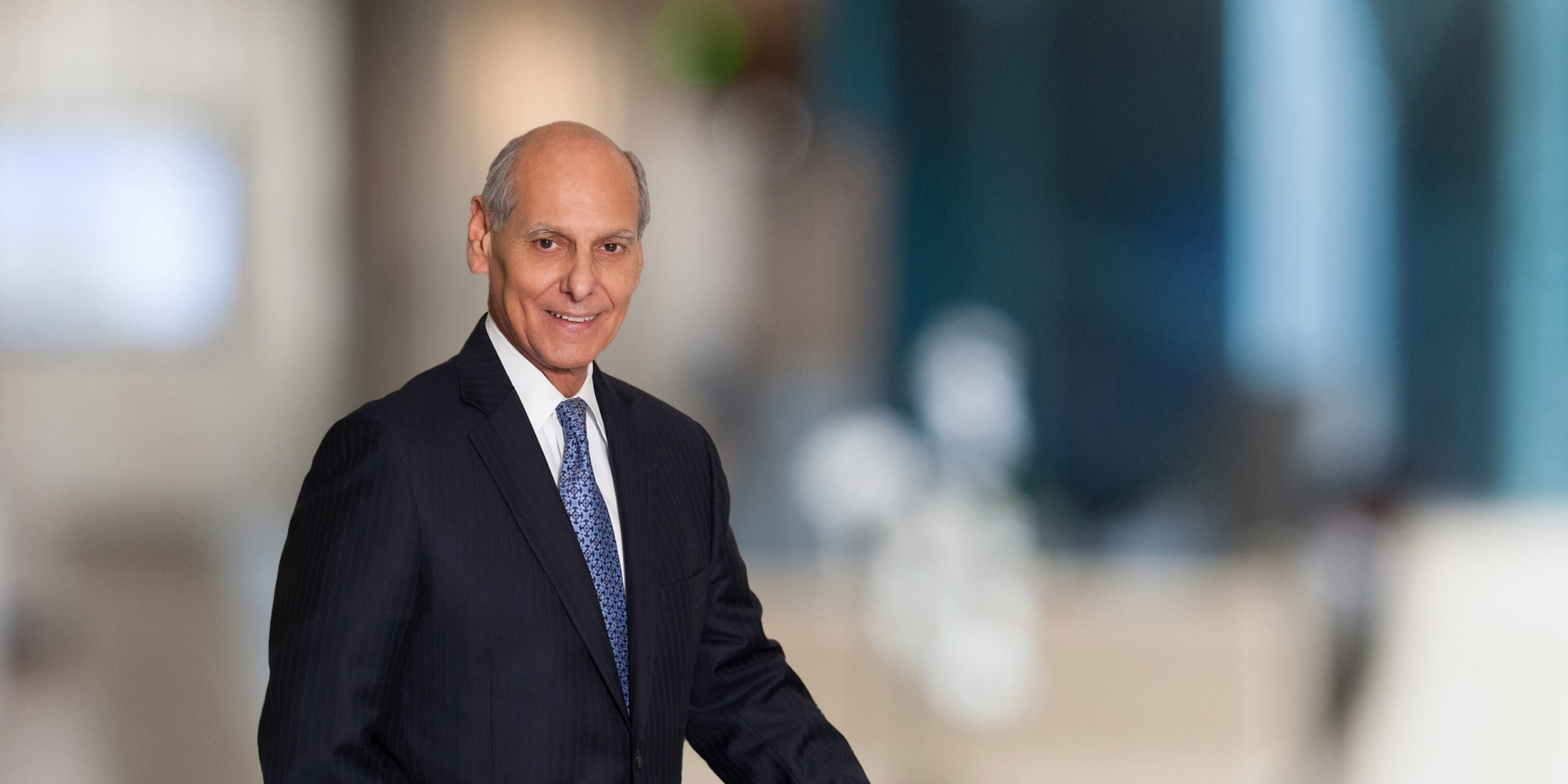 Vince Mastracco in dark suit.