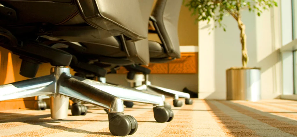 Chair rollers on conference room floor