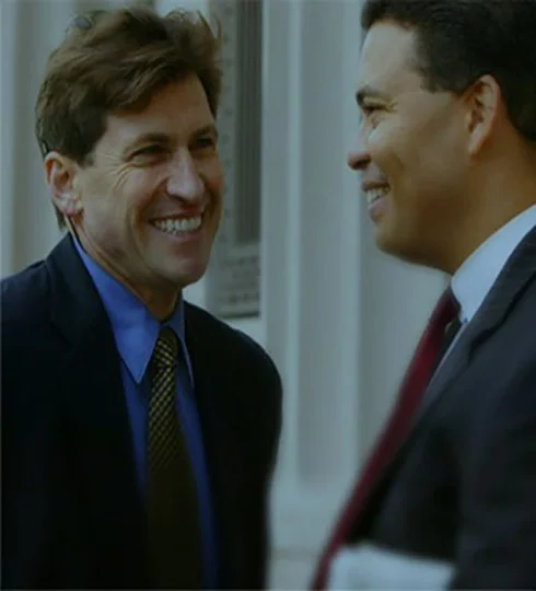 2 business men smiling