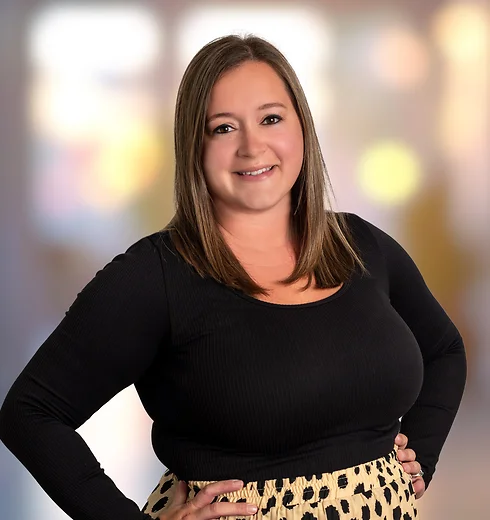 Smiling Brooke Burbage with a suit jacket