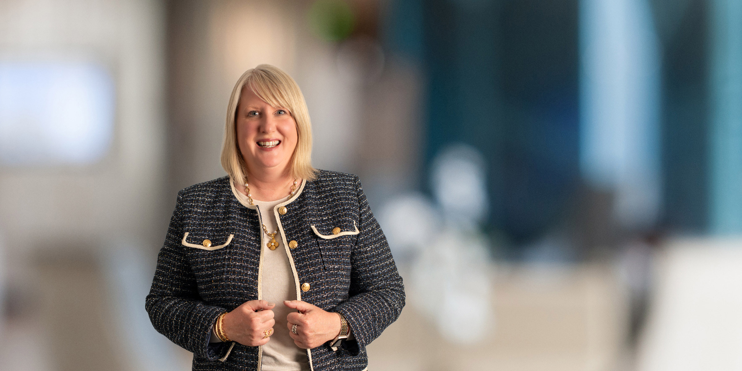 Lisa Hudson Kim in black tweed jacket