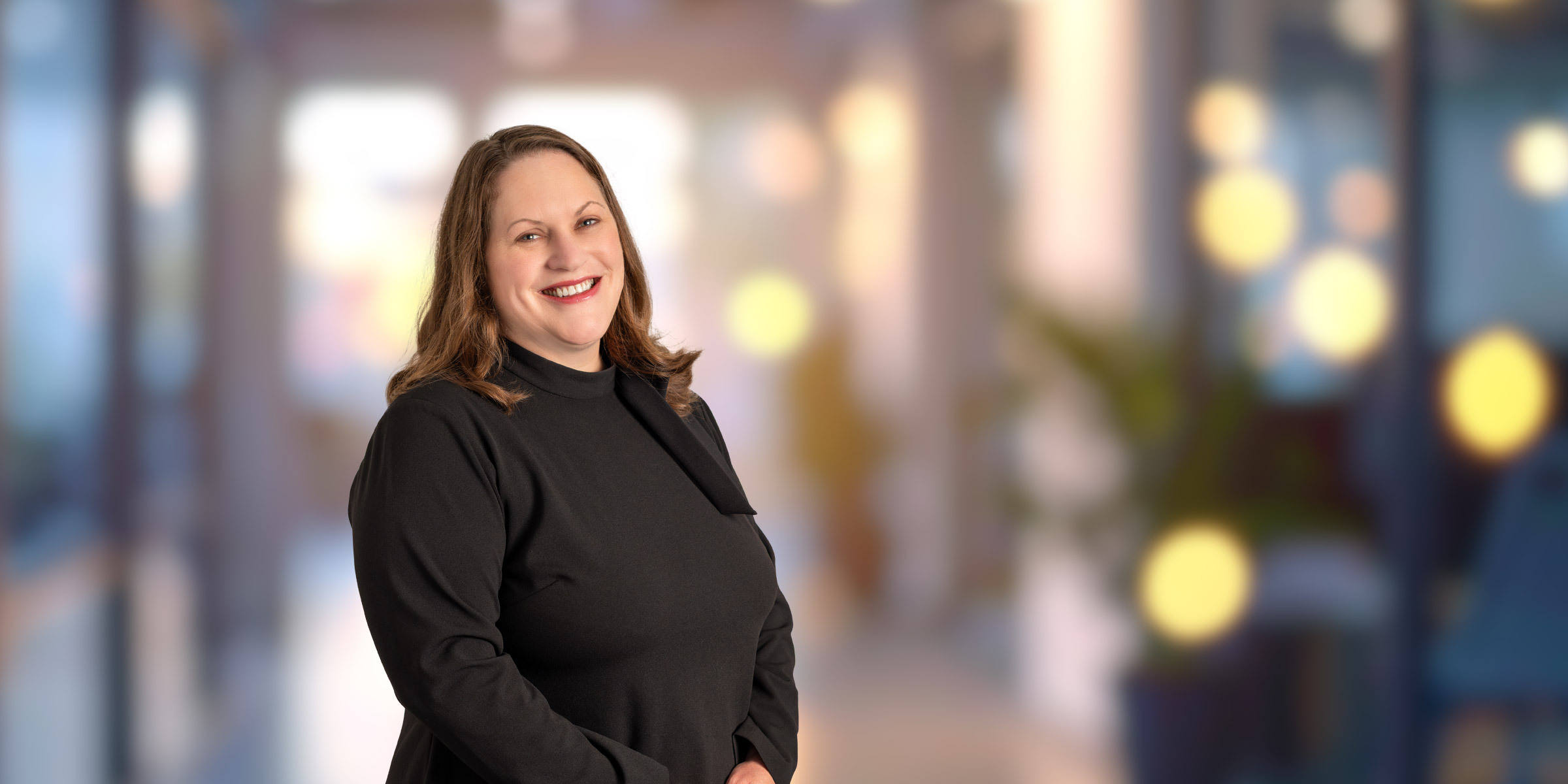 Amy Harman in black blouse