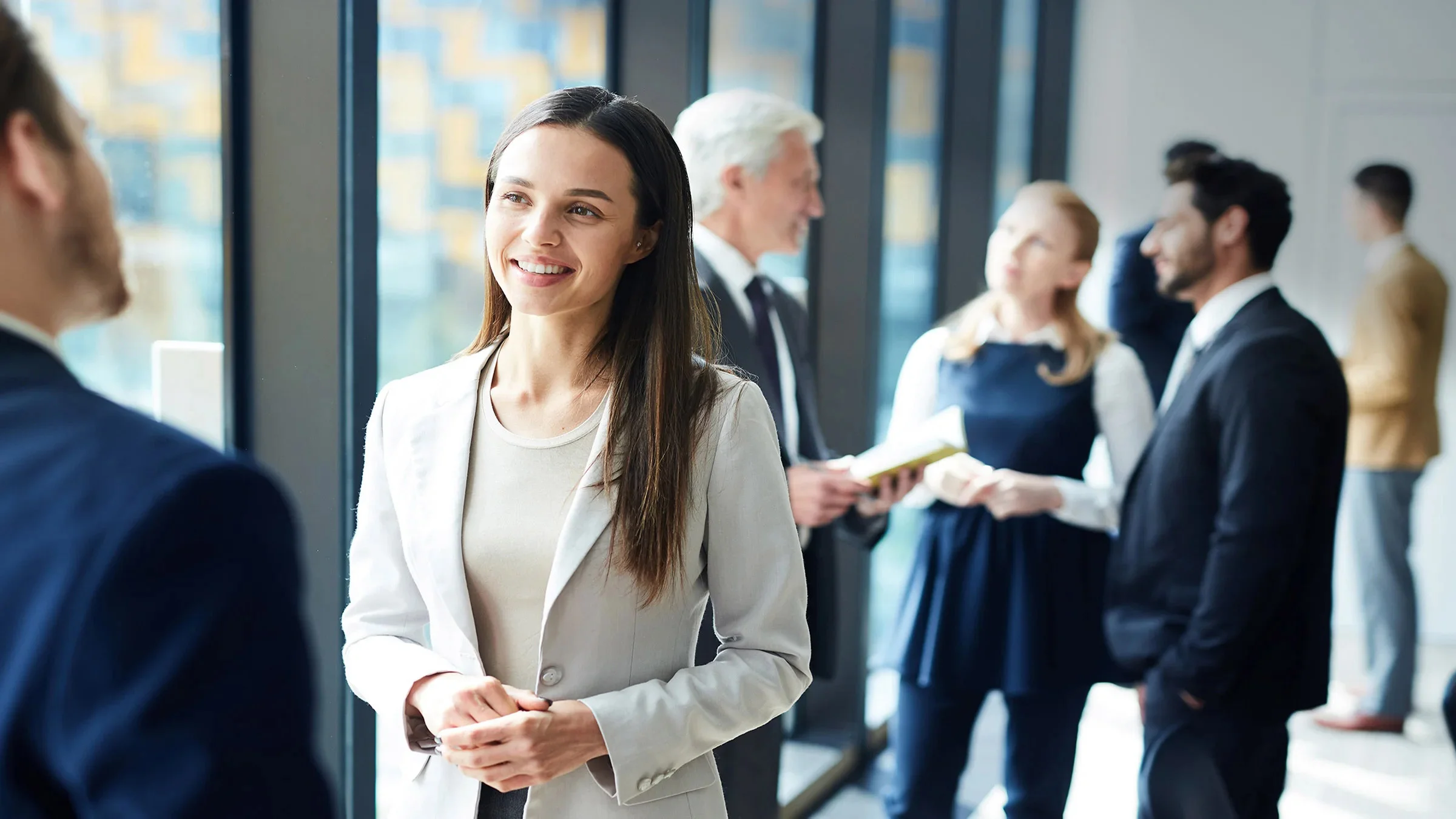 Smiling woman in a meeting