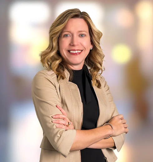 Nicole Naidyhorski in tan jacket