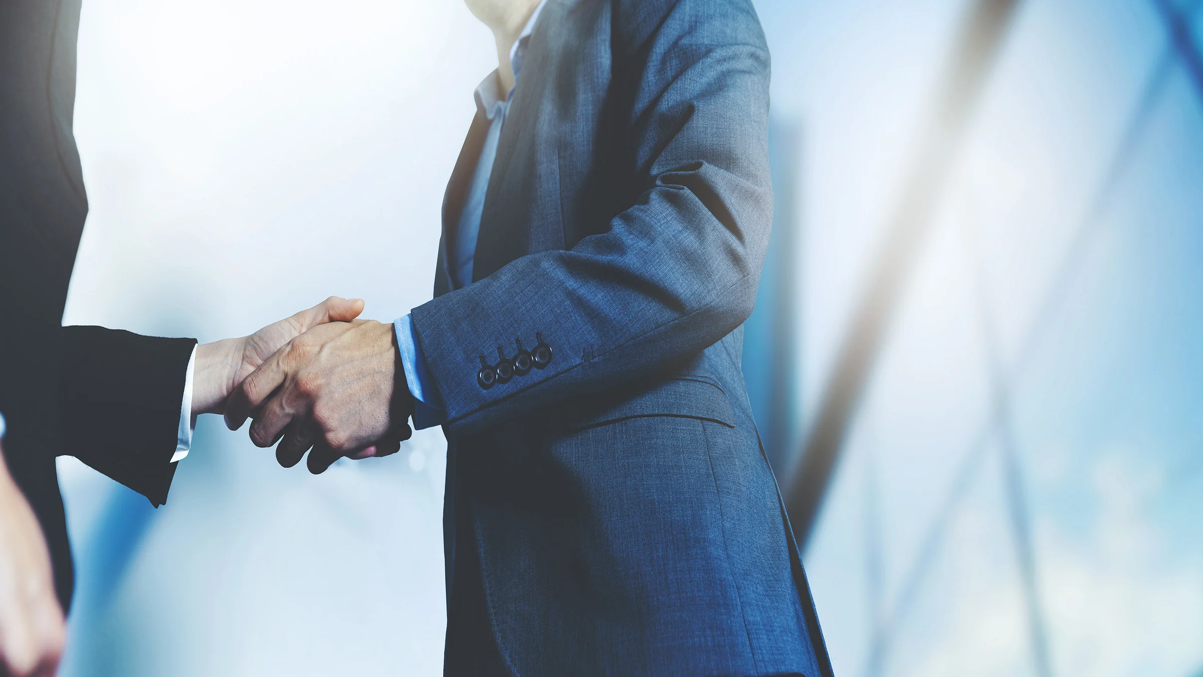 2 men shaking hands