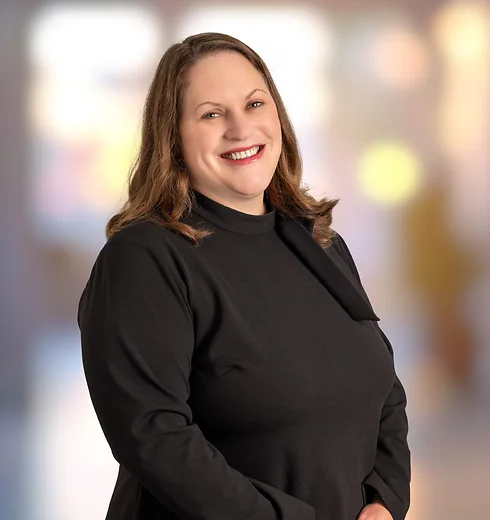 Amy Harman in black blouse