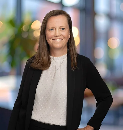Megan Gilliland in a black suit with a white shirt