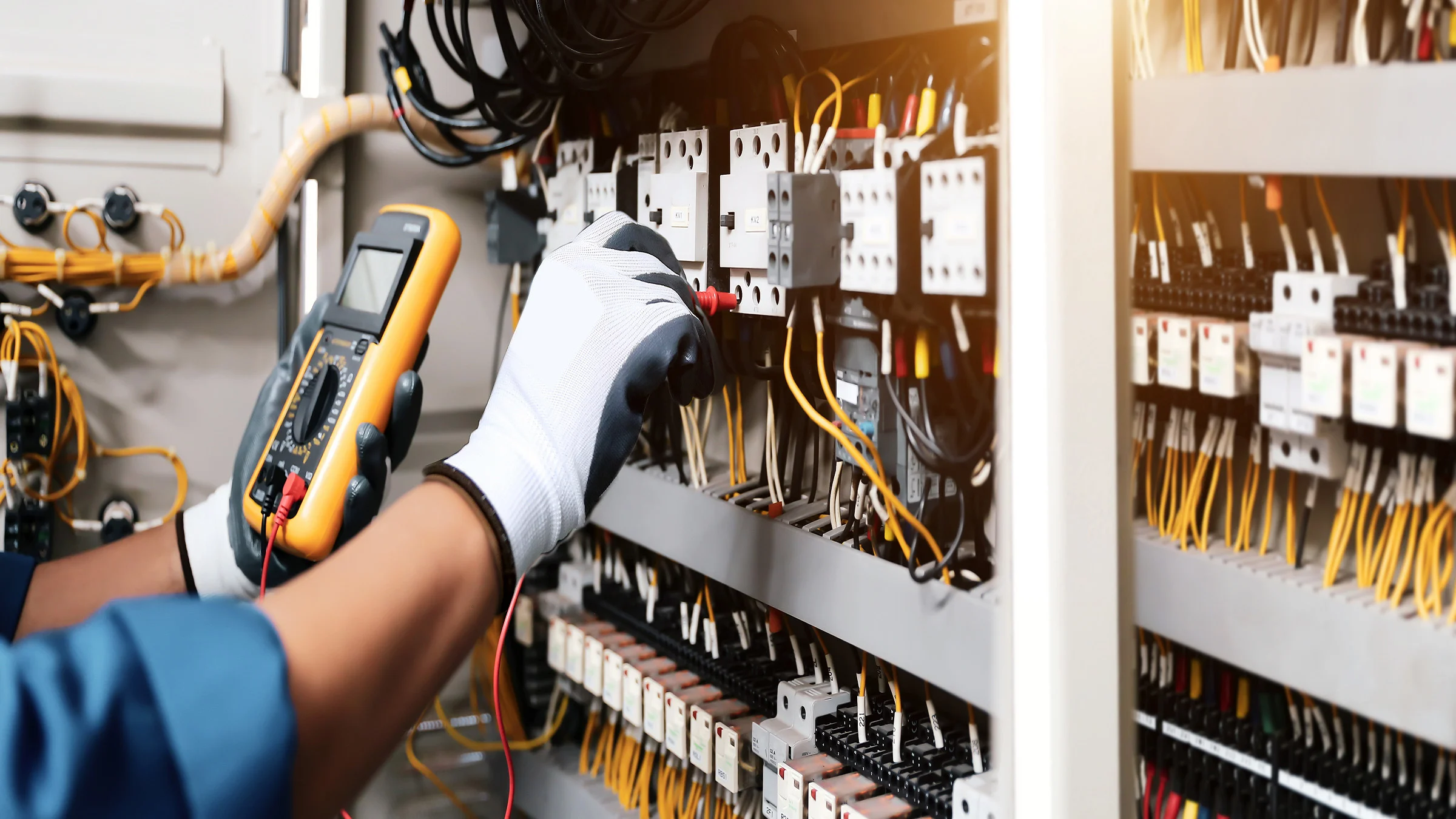 Engineer hand checking circuit breaker