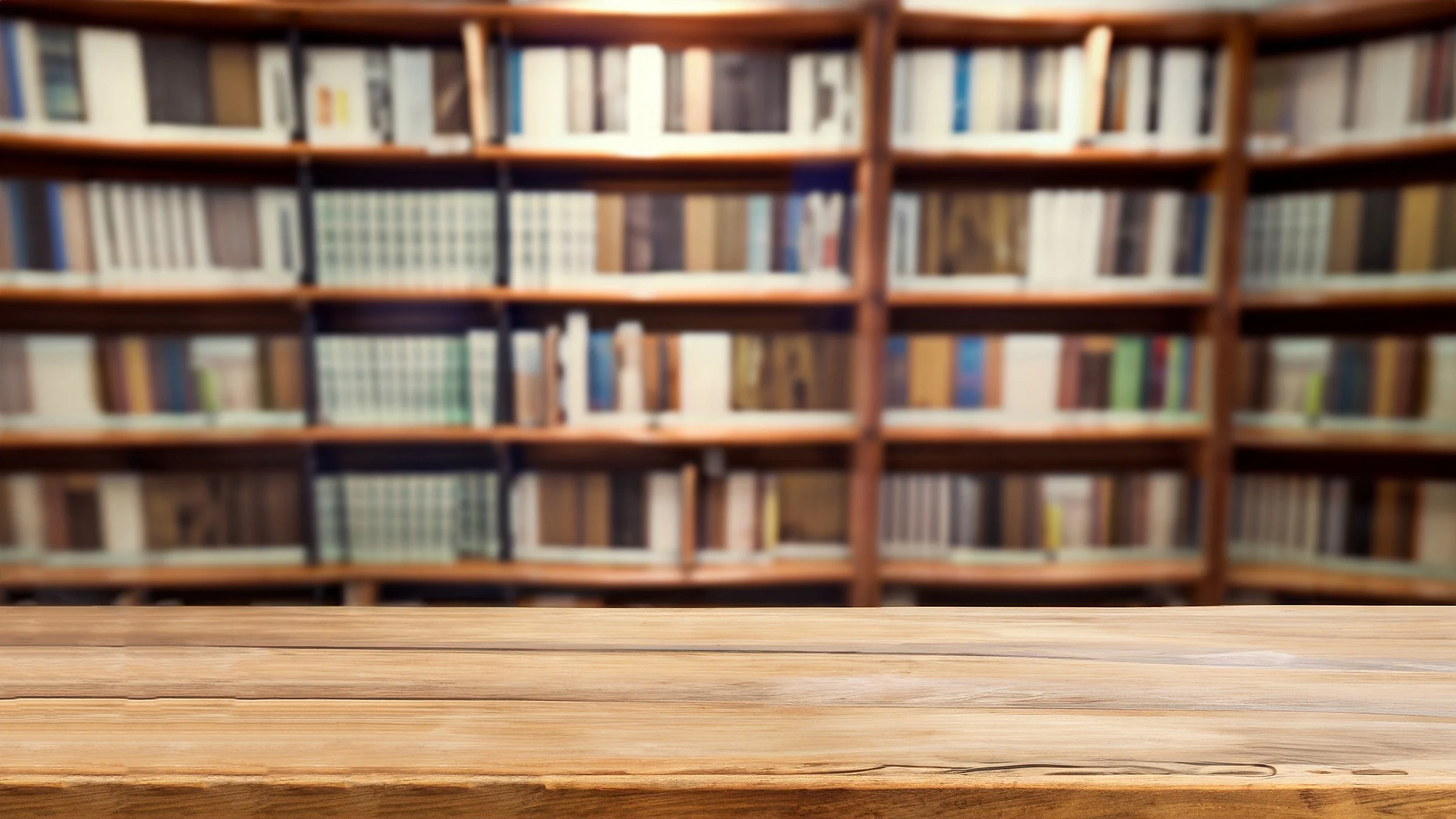 Blurry books on shelves in background