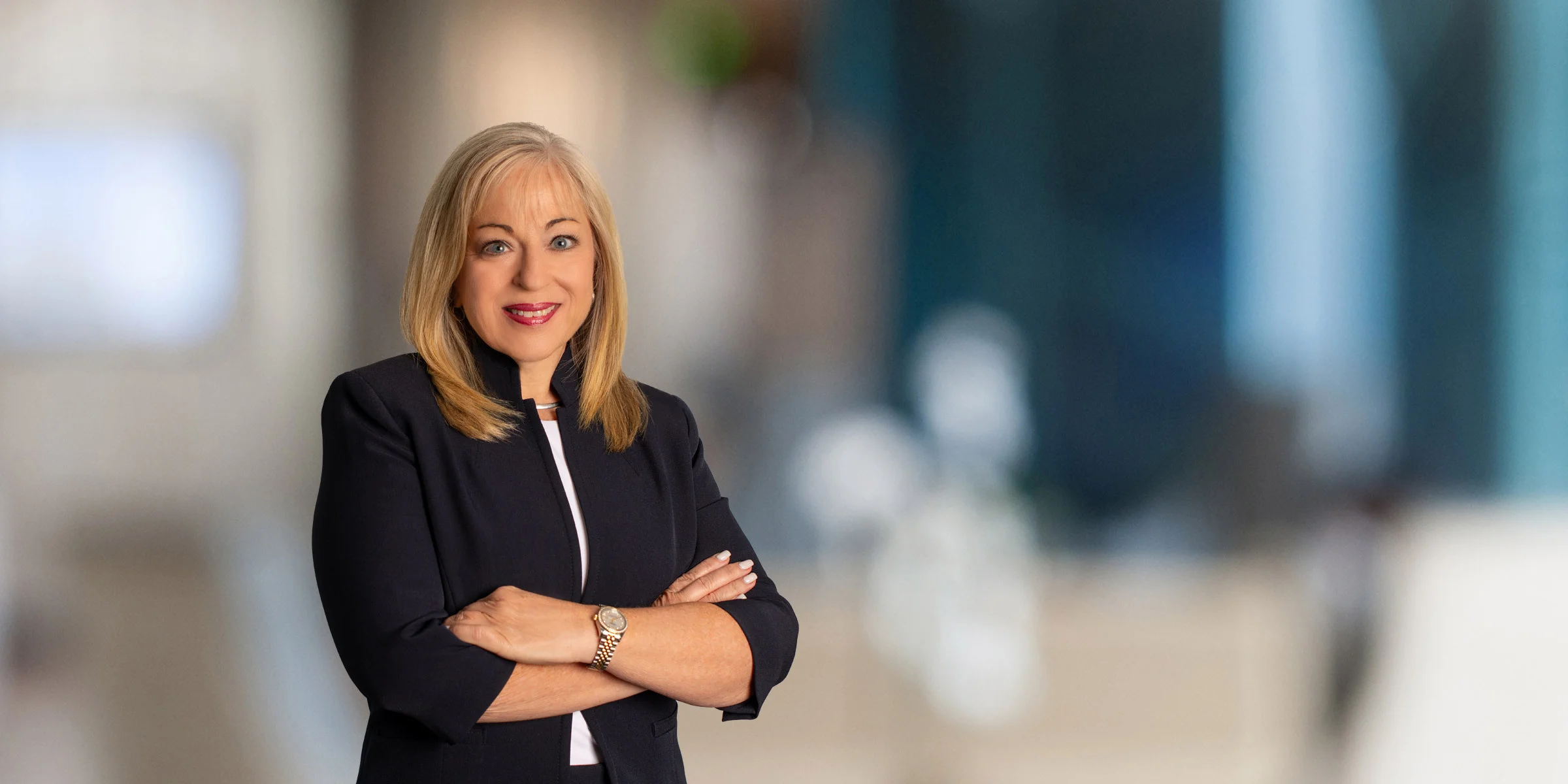 Vonda Chappell with her arms crossed in a black jacket